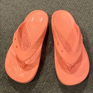 Crocs Coral Orange Flip Flops (sz 7)